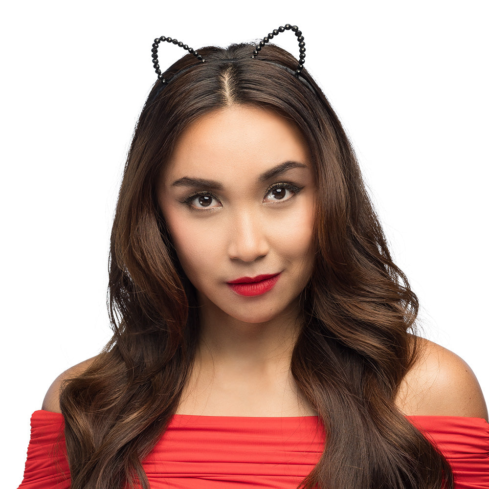 Black diamond cat tiara for women and girls, elegant headpiece made of iron, zinc, glass, polyester, and PVC, displayed with hangtag packaging.