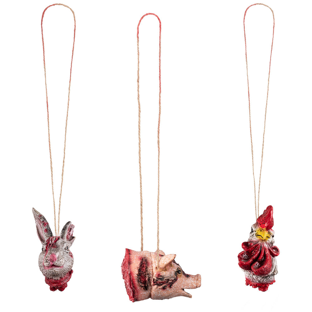 Set of three severed animal head decorations for Halloween, made of PVC, polyester, and hemp, ideal for horror-themed party decor.