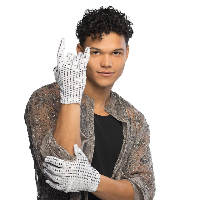 Pair of silver sequin gloves for adults, unisex design, made of polyester and PVC, ideal for costumes or parties.