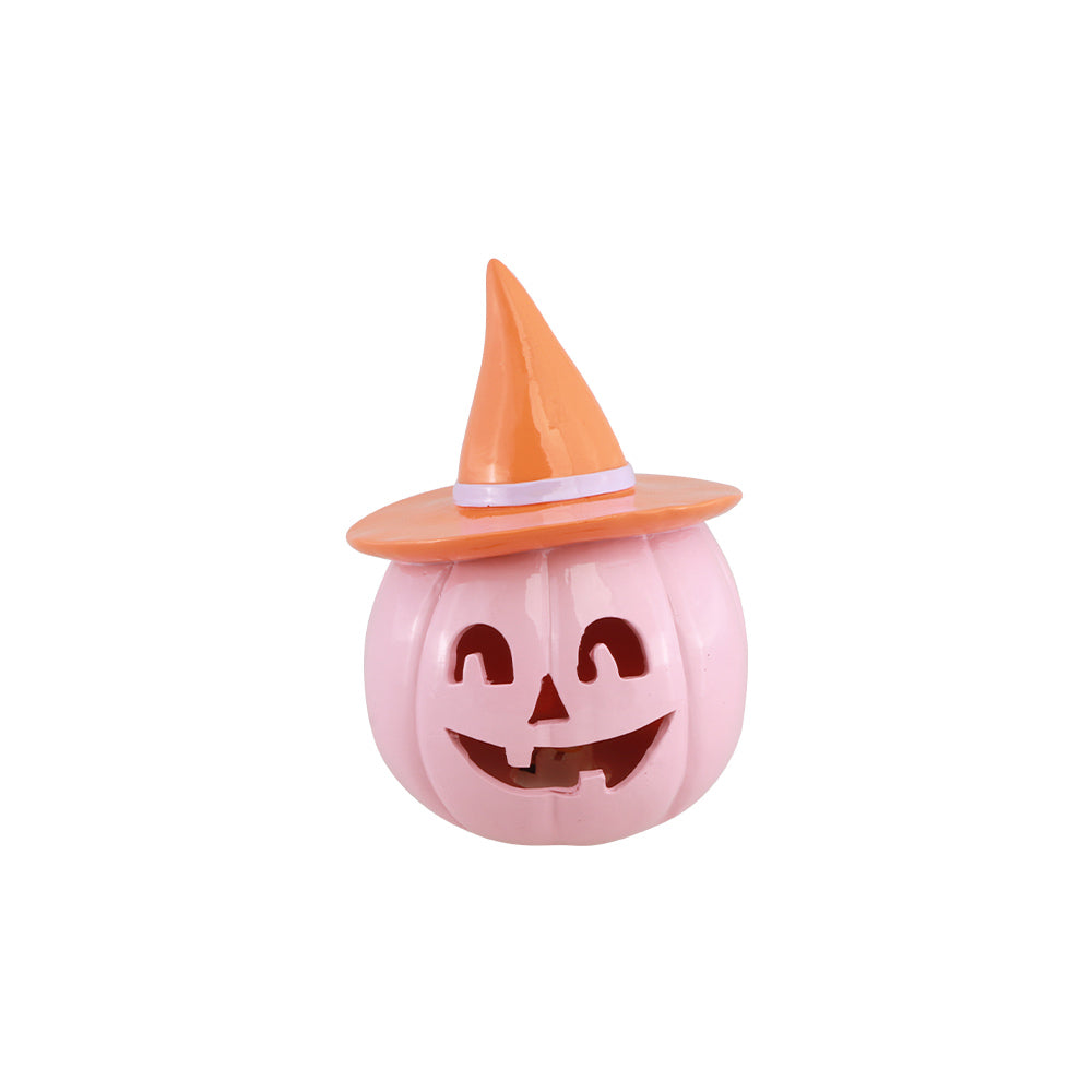 Citrouille Halloween rose pastel en résine avec chapeau de sorcière orange, vue de face, décoration d'Halloween