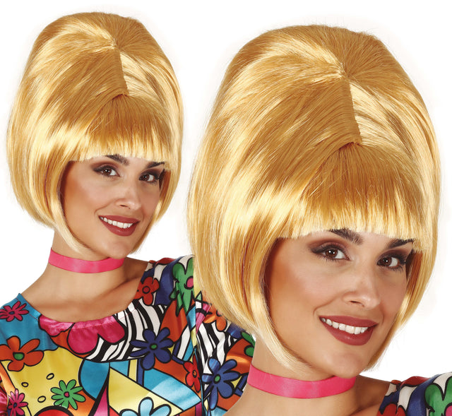 Blonde 1960s style synthetic hair wig in box, retro costume accessory for themed parties.