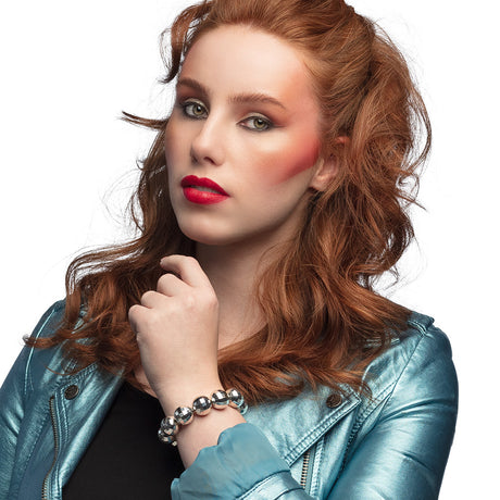 Silver disco ball bracelet for women, 80s inspired jewelry accessory made of ABS and rubber, perfect for adult party outfits.