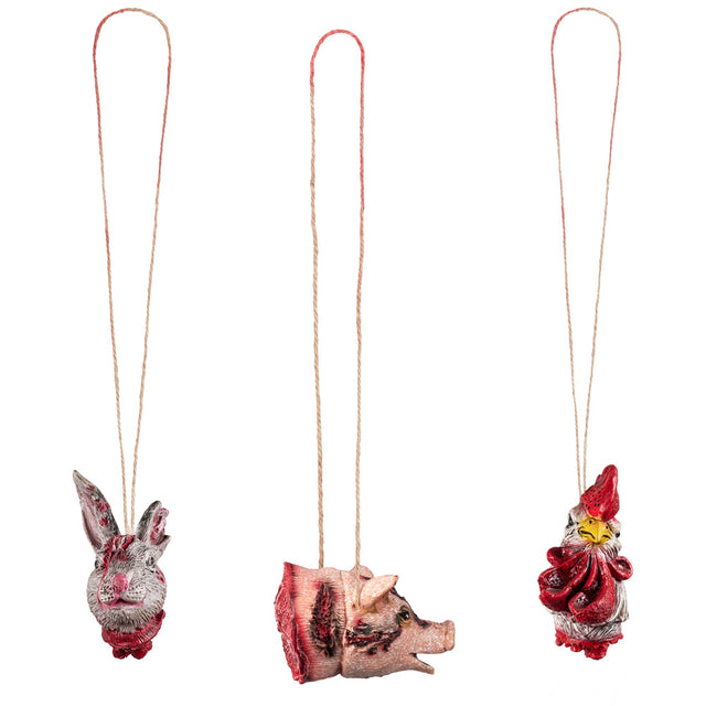 Set of three severed animal head decorations for Halloween, made of PVC, polyester, and hemp, ideal for horror-themed party decor.