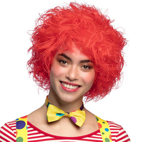 Red frizzy clown wig for adults made of 100% polyester, perfect for circus costumes and party outfits.