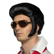 Deluxe Rock 'n Roll wig for men, black polyester, 1950s style, adult costume accessory in box packaging.