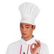 White chef hat for men made of 100% polyester, adult size, displayed on an insert card, ideal for professional kitchen uniforms.