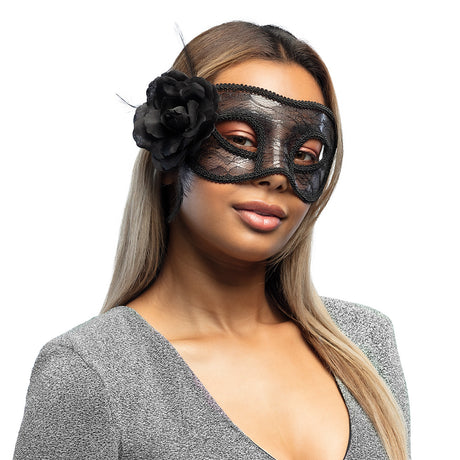 Black lace masquerade mask for women with mystic design, featuring PVC, polyester, and feather details, perfect for Halloween or costume parties.
