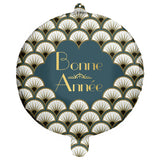 The image shows a round foil balloon with a "Bonne Année" (Happy New Year) message in French, featuring a blue and gold Art Deco flapper design.