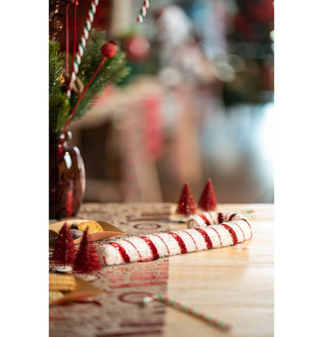 The image shows a large candy cane decoration with red and white stripes and a sparkling, glittery finish, measuring approximately 11cm x 29cm.