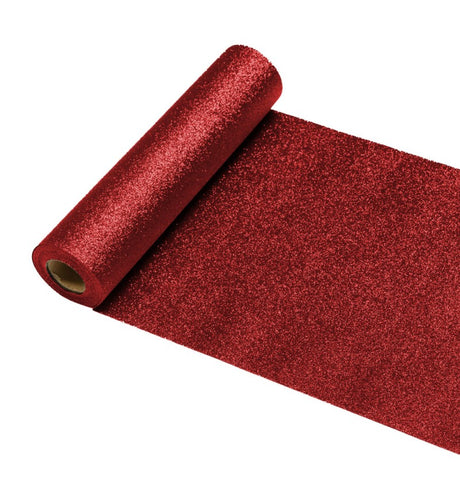 The image shows a red sequin table runner, rolled out on a table, designed for party or festive decoration.