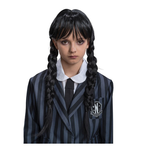The image shows a child wearing a black braided wig styled to resemble Wednesday Addams from the Addams Family, indicating a costume suitable for a themed party or Halloween event.