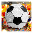 The image shows a piñata designed to resemble a soccer ball, intended for party use.
