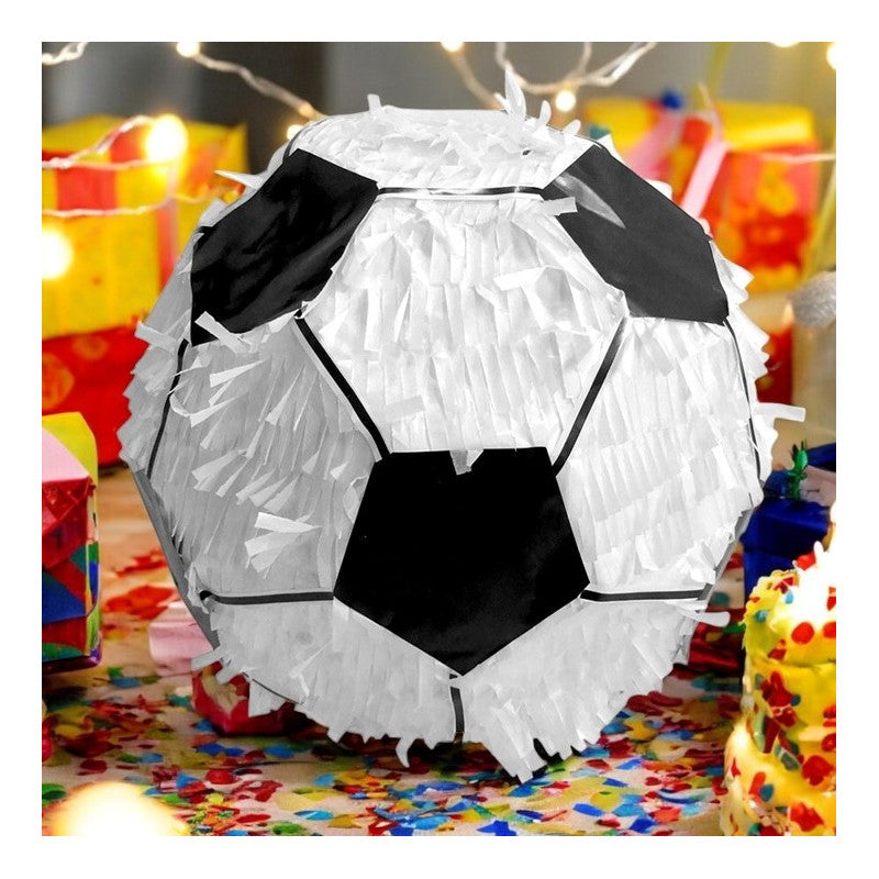 The image shows a piñata designed to resemble a soccer ball, intended for party use.