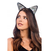 The image shows a headband featuring cat ears adorned with diamond-like rhinestones, measuring approximately 22cm by 17cm, designed as a party accessory.